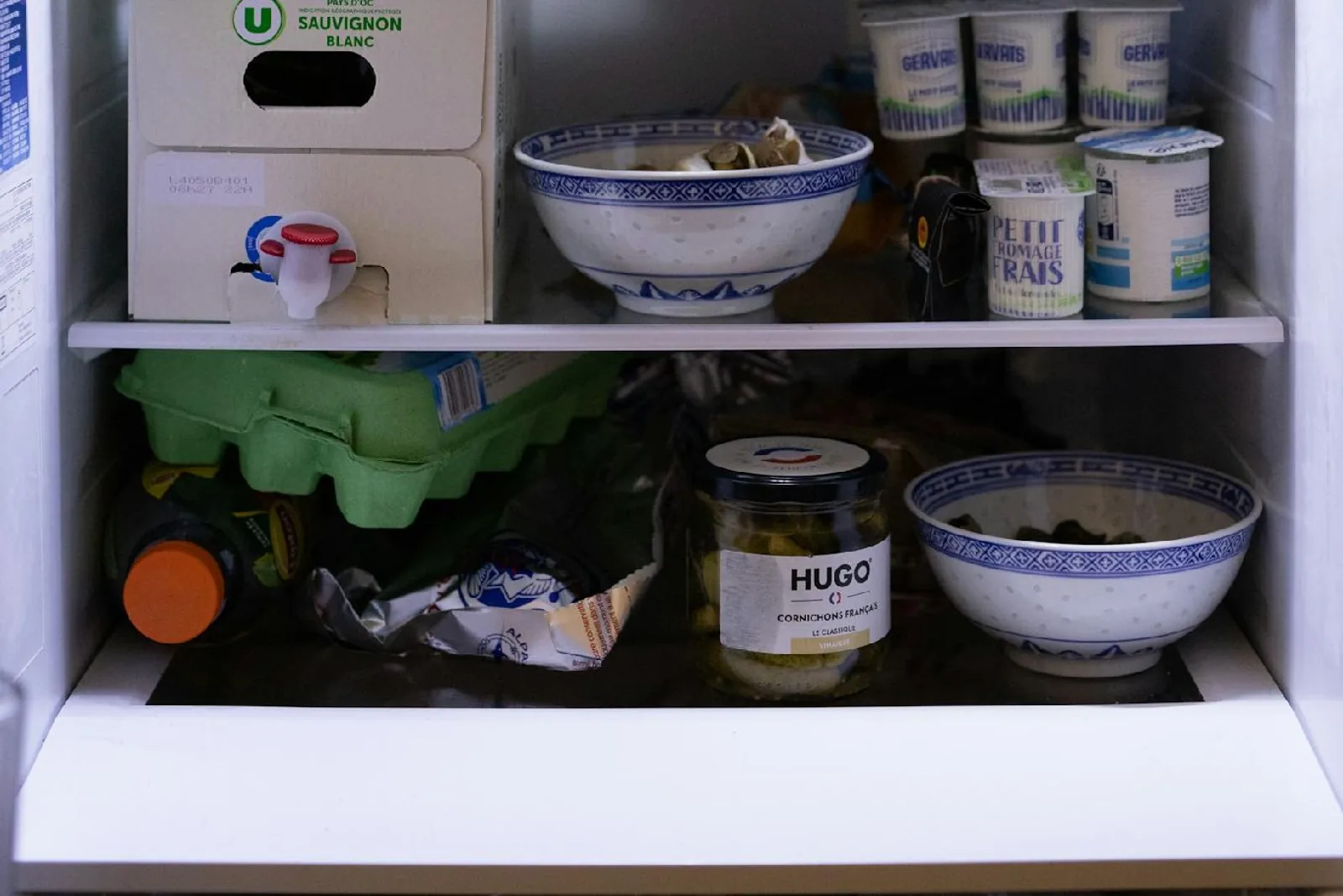 An open refrigerator filled with food