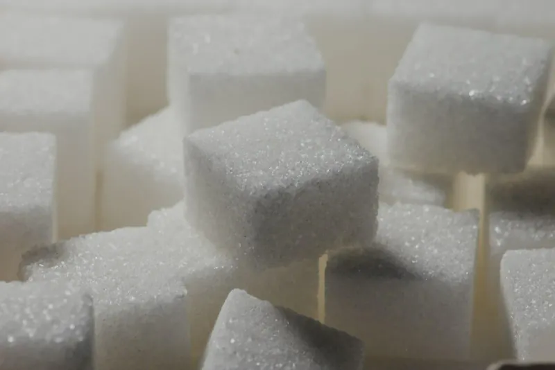 A pile of white sugar cubes